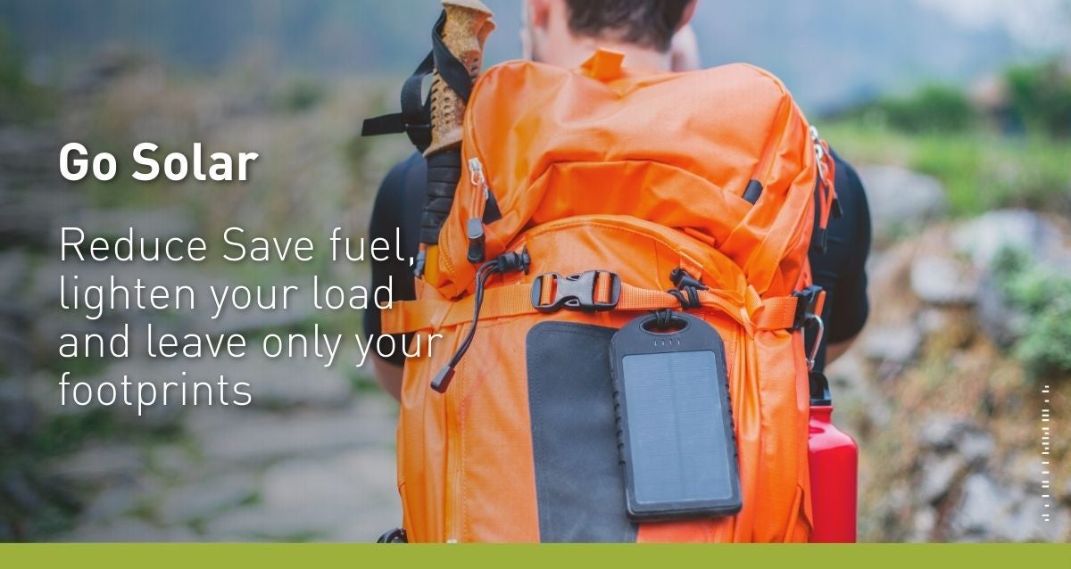 Go Solar: image of someone wearing an orange backpack on a blurred out trail with water in the distance