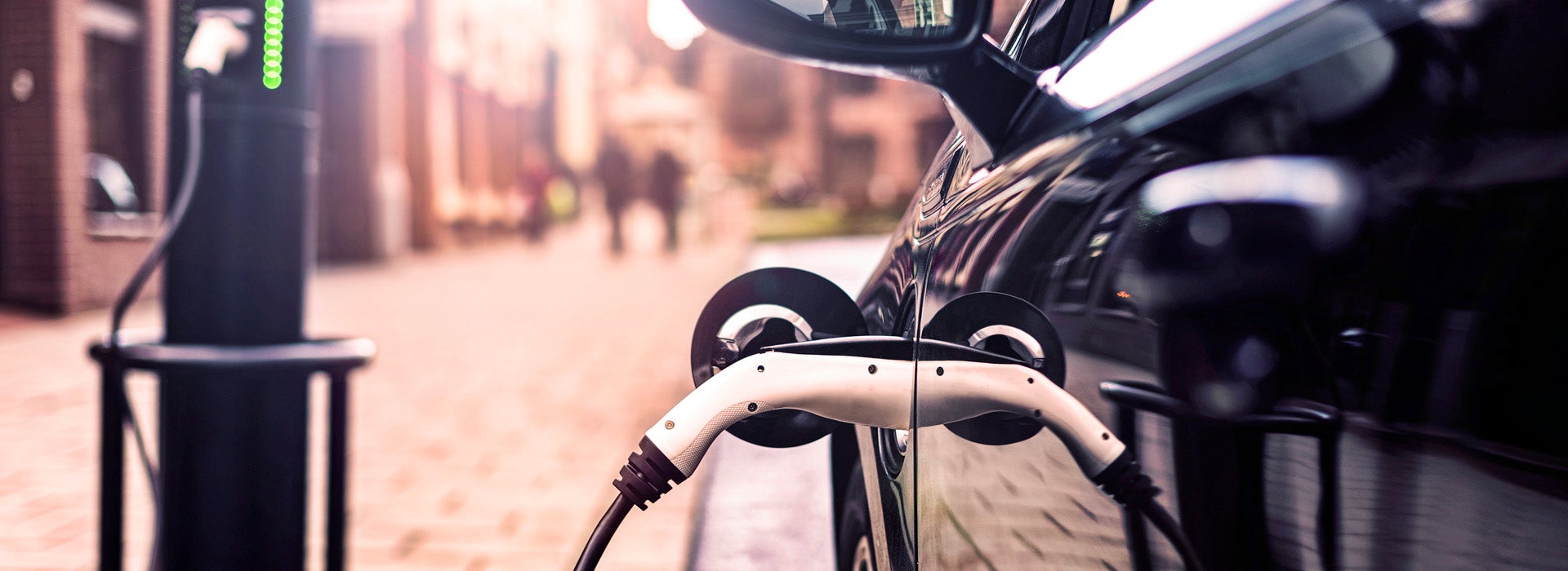 Electric Vehicle at streetside charging station